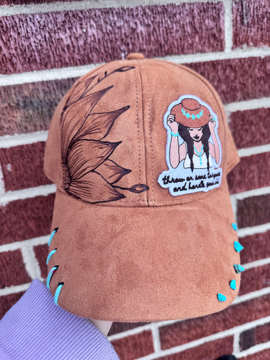 Hand burned turquoise cowgirl adult rts trucker hat.