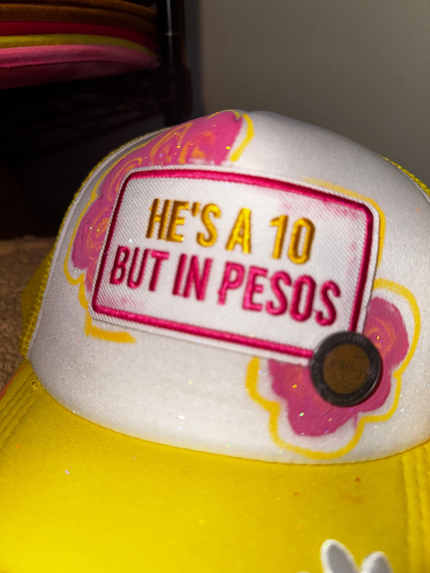 He’s a 10 but in Pesos. Womens trucker hat