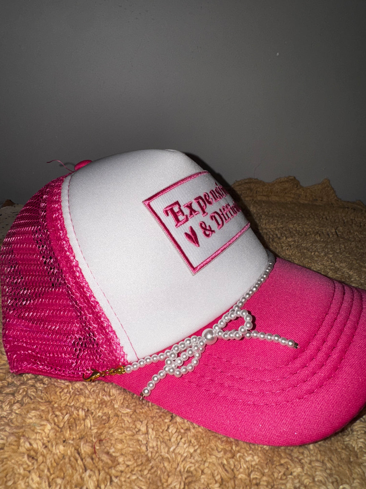 Expensive & difficult trucker hat.