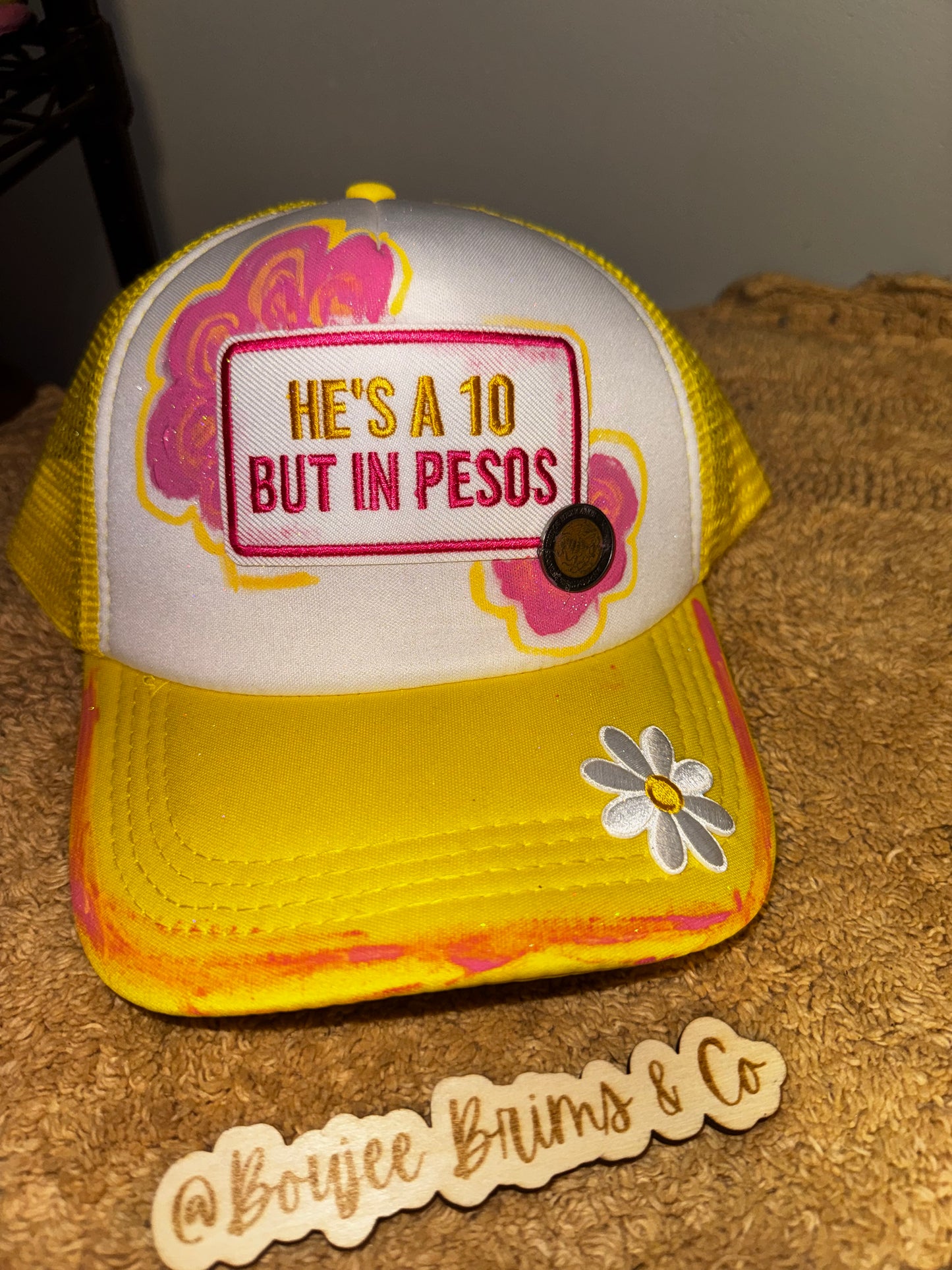 He’s a 10 but in Pesos. Womens trucker hat