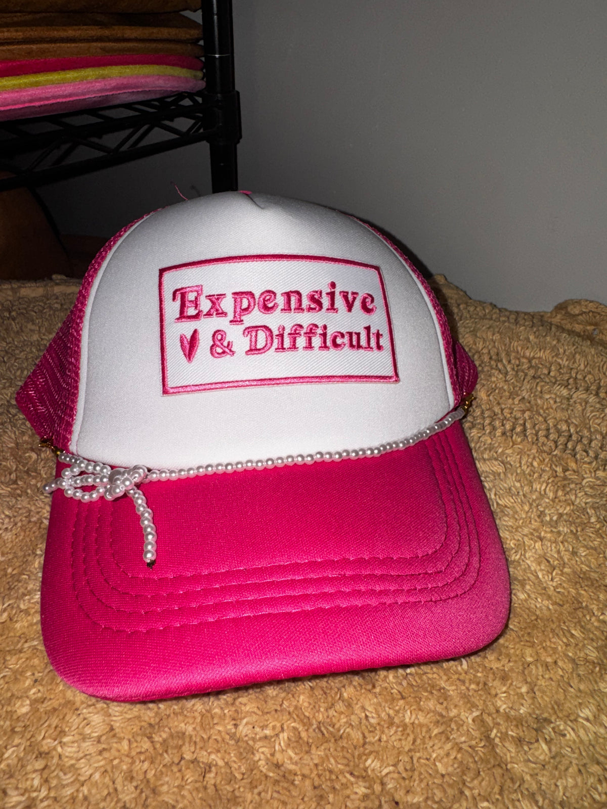 Expensive & difficult trucker hat.